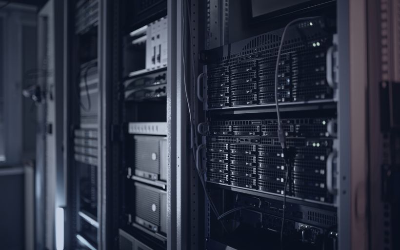 Rack-mounted compute servers in a data hall.